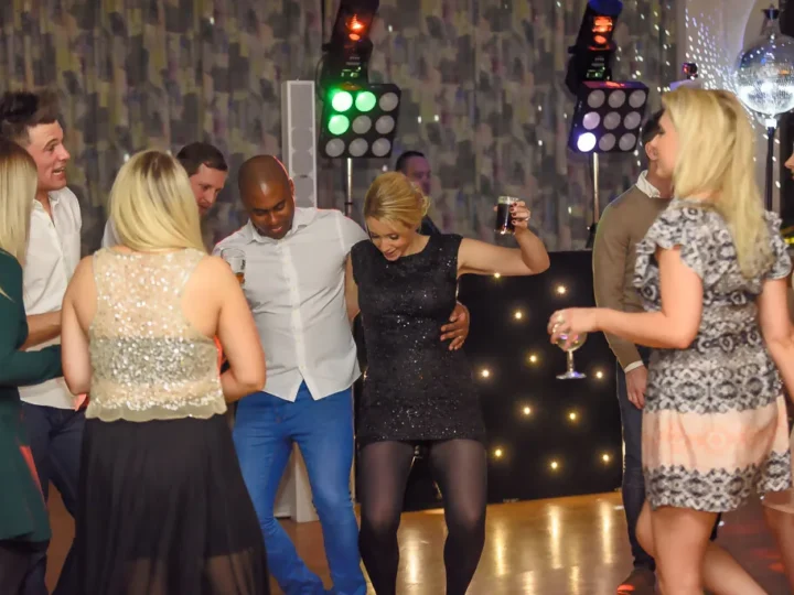 Professional DJ lighting setup with disco ball and LED lights - Essex party